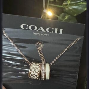 Coach Rose Gold and Cream Logo Ring Pendant Necklace